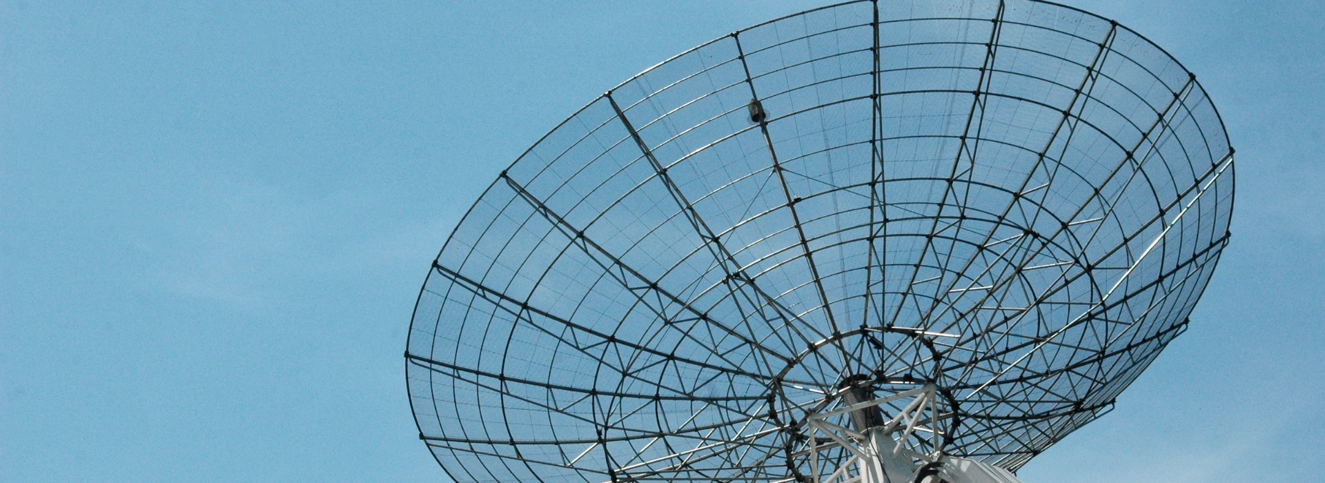 Satellite dish being installed on rooftop